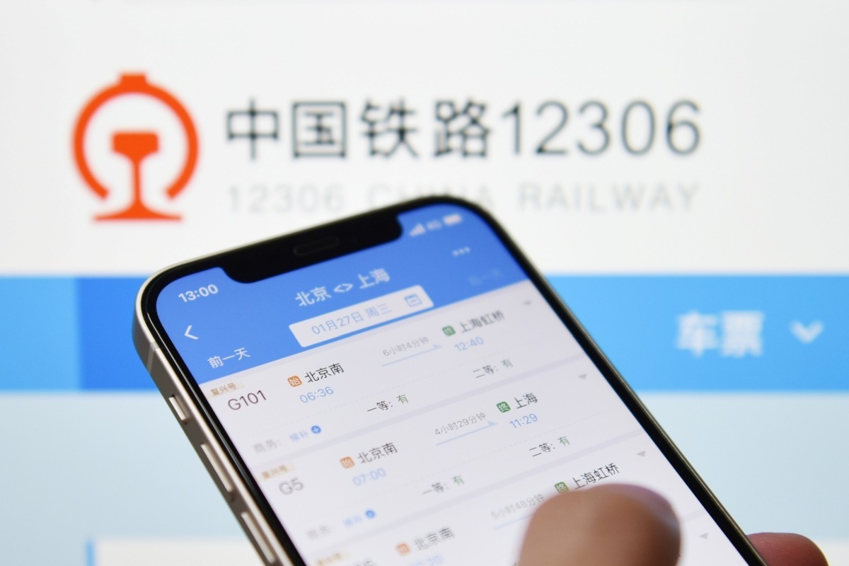 Mobile phone with train booking app