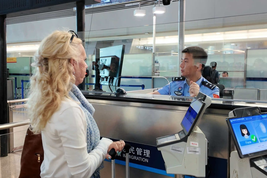 Biometric fingerprint scanner at immigration kiosk